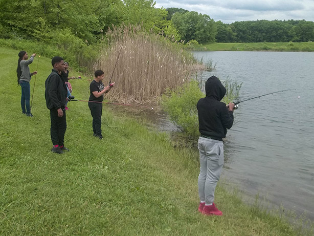 Students fish as part of a program with the Conservancy for Cuyahoga Valley National Park