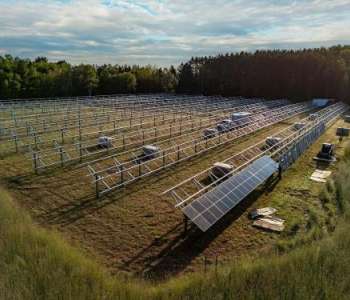 An array of solar panels under construction. An array of solar panels under construction.
