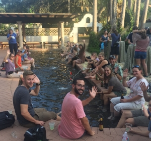 Participants from the 2018 Dream Big Summit enjoy their time with colleagues as they dip their feet in a Quinta Mazatlan pool!