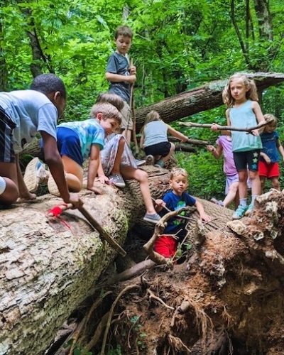 Louisville Nature Center - Kids climbing on log