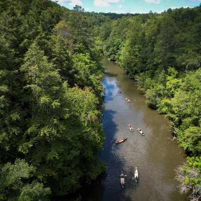 Canoers paddle down Clear Creek.