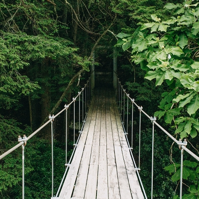 Camp McDowell's swinging bridge that crosses Clear Creek.