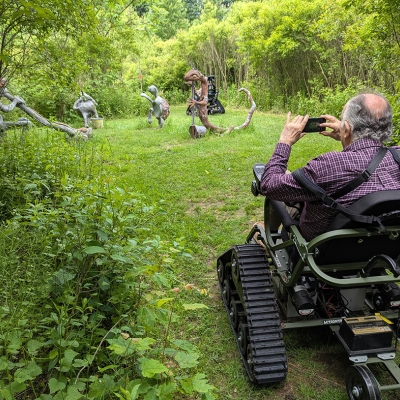 A visitor uses a Trackchair at Lime Hollow Nature Center. Photo submitted by Lime Hollow Nature Center.