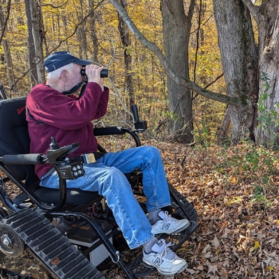 David Graham tries Baltimore Woods Nature Center trails using a Trackchair from Lime Hollow Nature Center. Photo submitted by Baltimore Woods Nature Center.