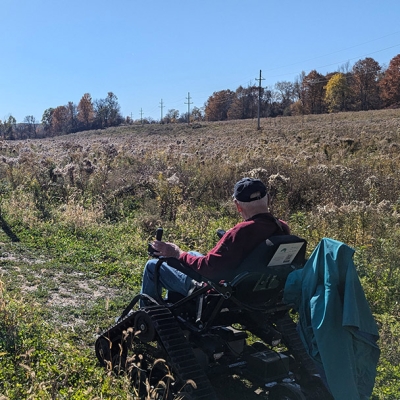 David Graham tries Baltimore Woods Nature Center trails using a Trackchair from Lime Hollow Nature Center. Photo submitted by Baltimore Woods Nature Center.